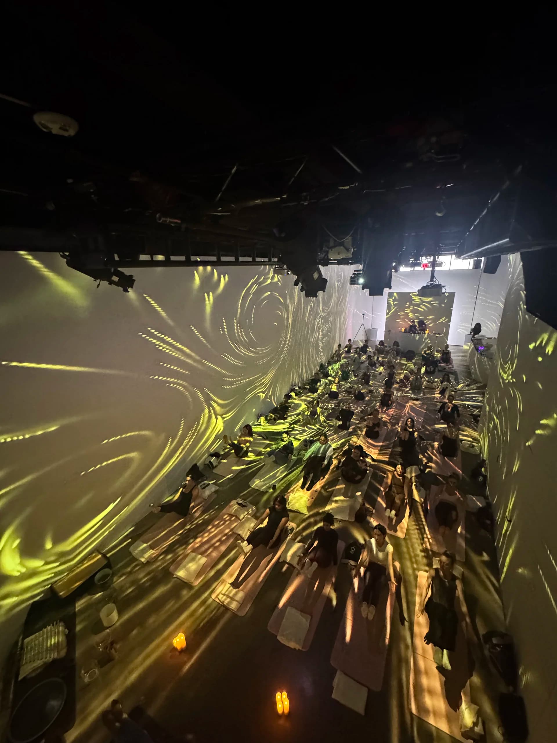 Generative visuals wrapping attendees during the experience