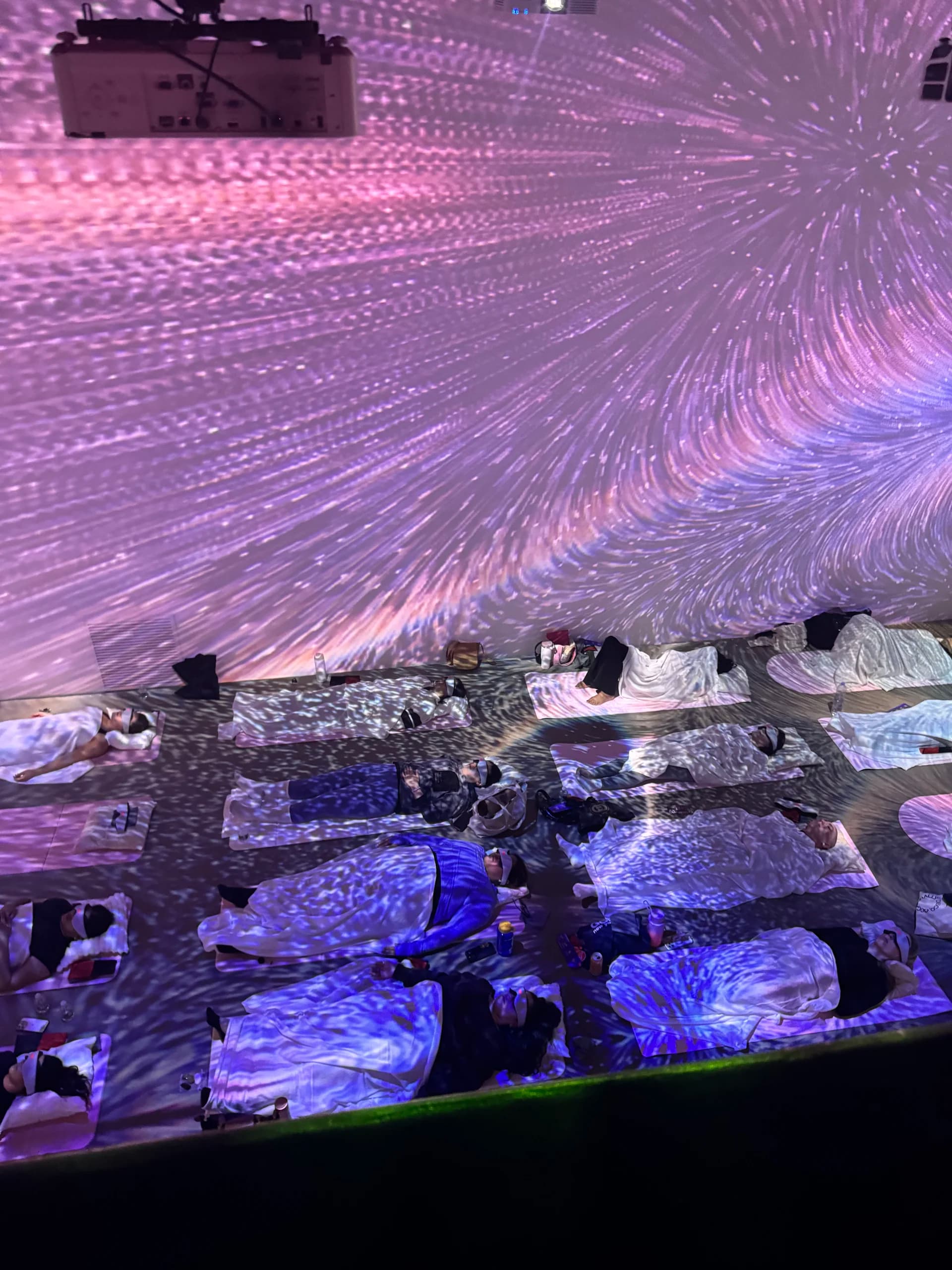 Pink particle burst projections from above during rest