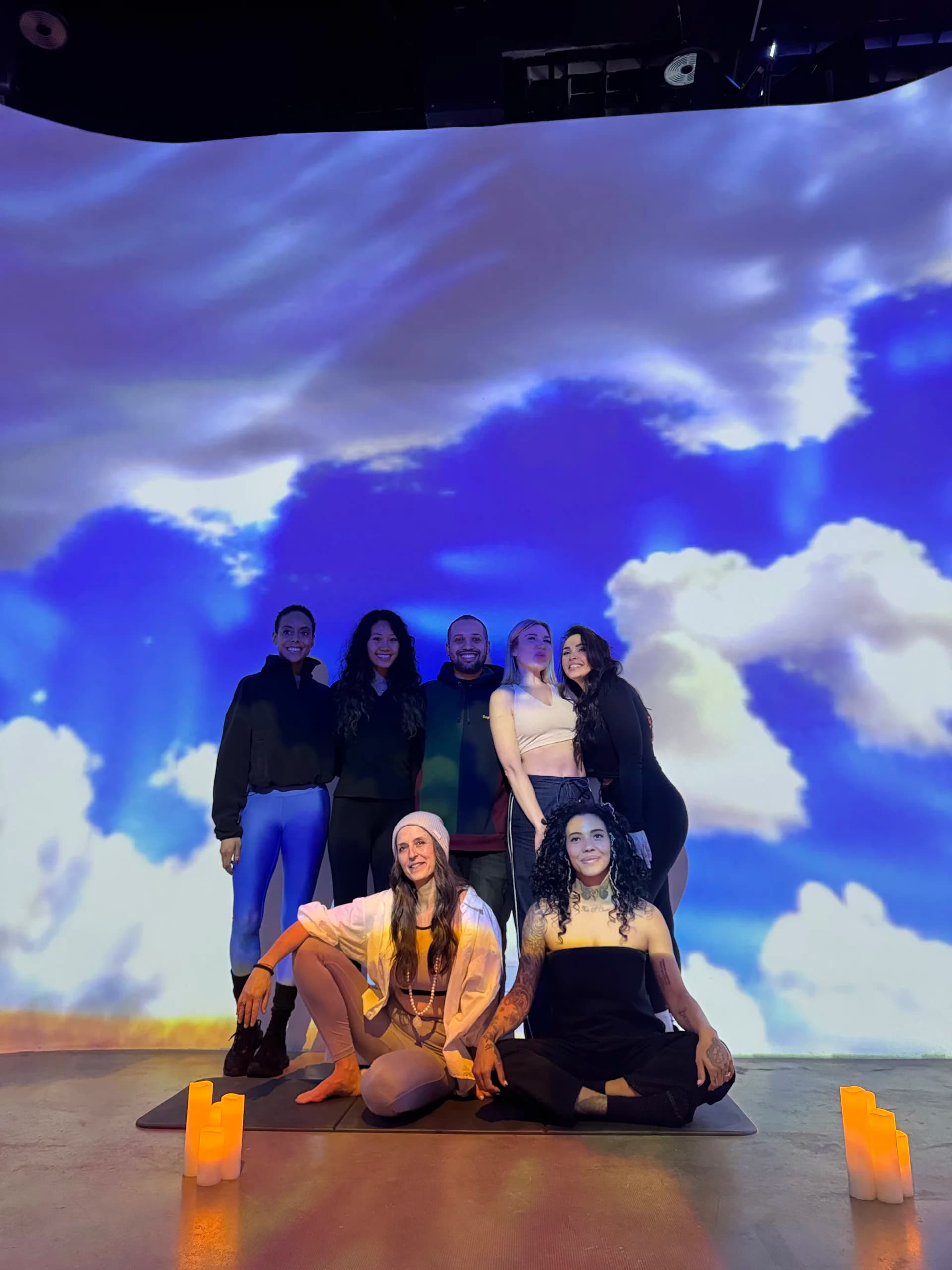 Team portrait with generative sky projections