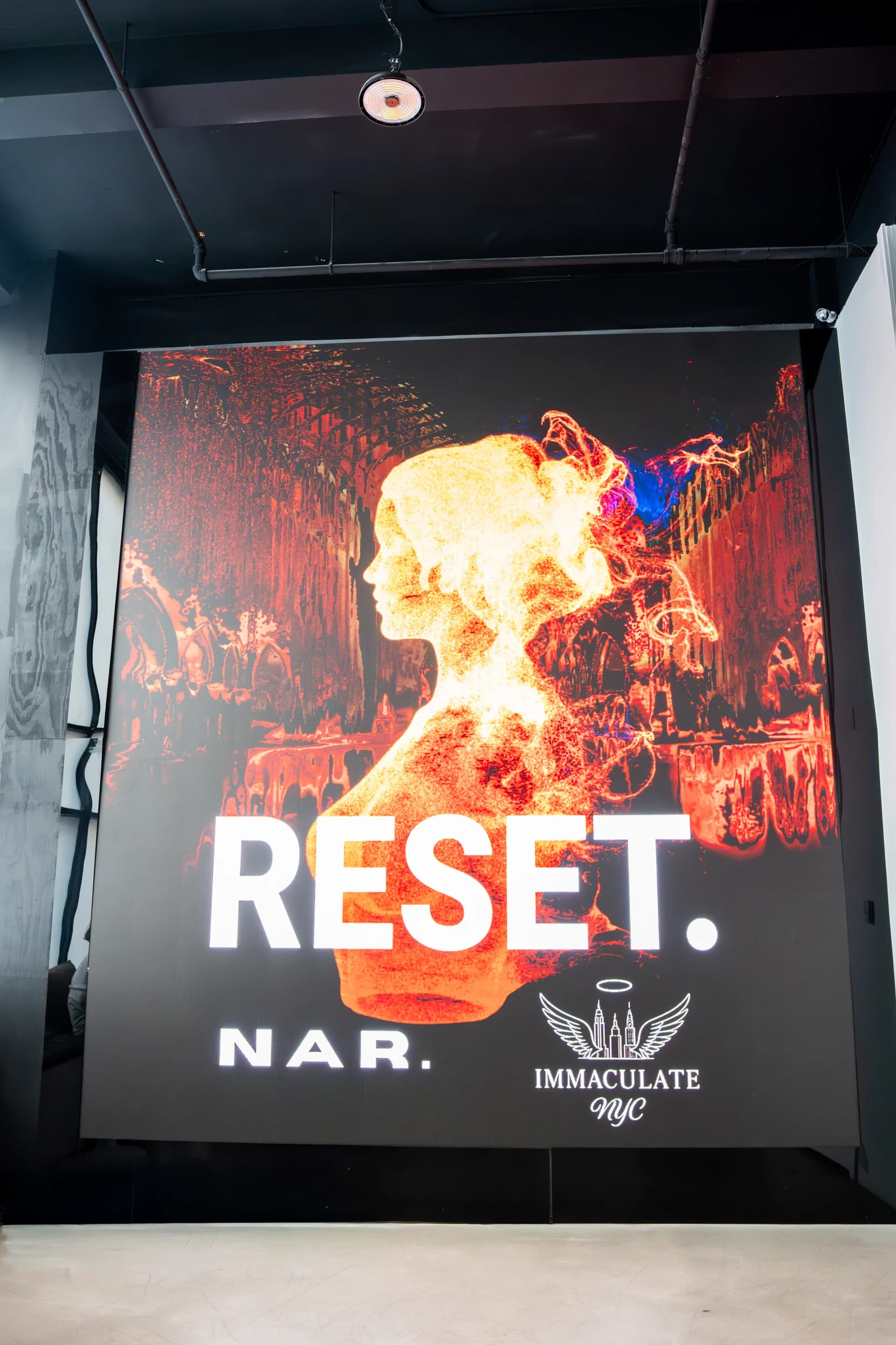 RESET event poster displayed on 16-foot LED wall
